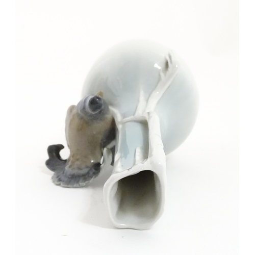 88A - A German Metzler & Ortloff vase with capercaillie bird detail. Approx. 8 3/4