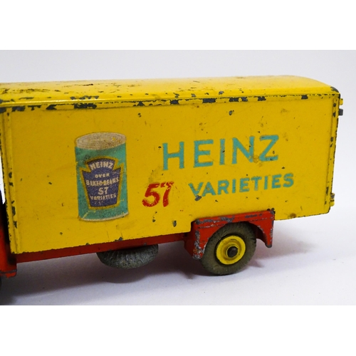 1295 - Toys: Two Dinky Supertoys die cast scale model vehicles comprising Big Bedford Heinz no. 923, and Gu... 
