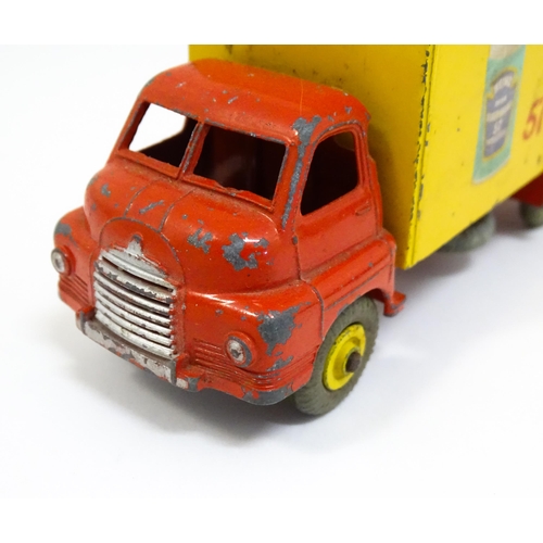 1295 - Toys: Two Dinky Supertoys die cast scale model vehicles comprising Big Bedford Heinz no. 923, and Gu... 