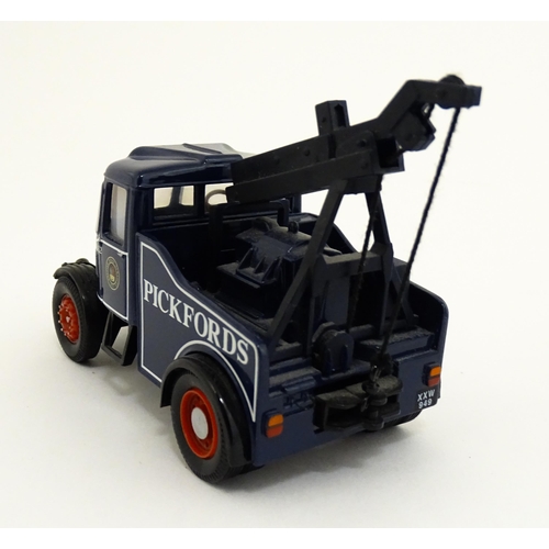 1296 - Toys: Three Corgi Toys die cast scale model vehicles comprising Corgi Classics Pickfords Scammell Hi... 