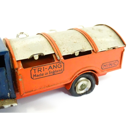 1300 - Toys: A quantity of vintage toys to include Teletone, a die cast scale mode Dinky Toys Routemaster B... 