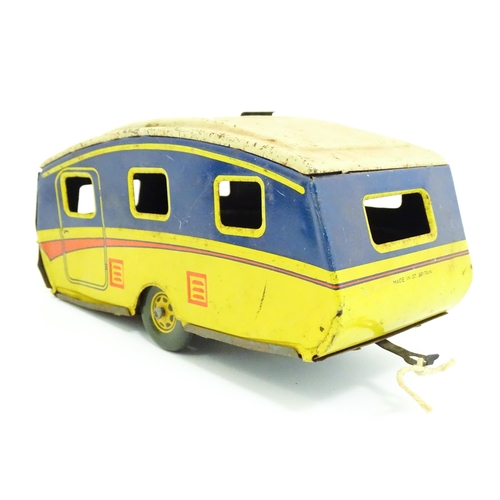 1300 - Toys: A quantity of vintage toys to include Teletone, a die cast scale mode Dinky Toys Routemaster B... 