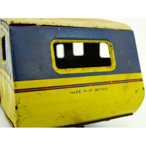 1300 - Toys: A quantity of vintage toys to include Teletone, a die cast scale mode Dinky Toys Routemaster B... 