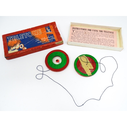 1300 - Toys: A quantity of vintage toys to include Teletone, a die cast scale mode Dinky Toys Routemaster B... 