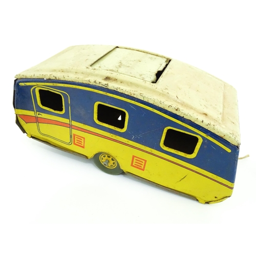 1300 - Toys: A quantity of vintage toys to include Teletone, a die cast scale mode Dinky Toys Routemaster B... 