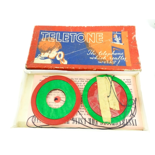 1300 - Toys: A quantity of vintage toys to include Teletone, a die cast scale mode Dinky Toys Routemaster B... 