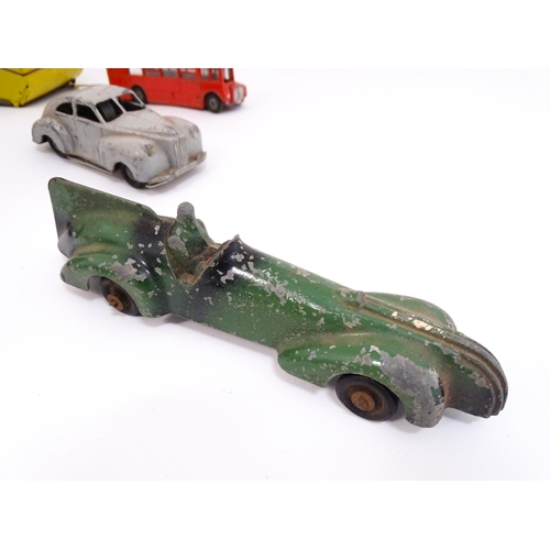 1300 - Toys: A quantity of vintage toys to include Teletone, a die cast scale mode Dinky Toys Routemaster B... 
