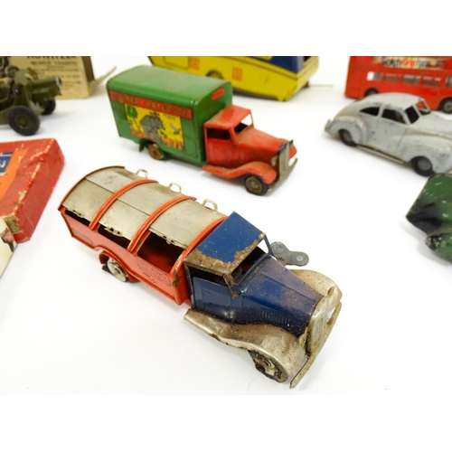 1300 - Toys: A quantity of vintage toys to include Teletone, a die cast scale mode Dinky Toys Routemaster B... 