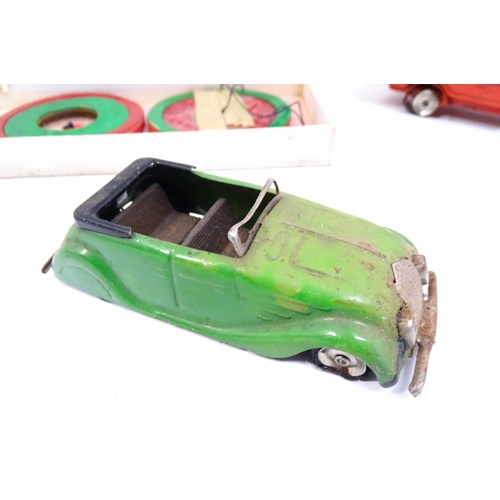 1300 - Toys: A quantity of vintage toys to include Teletone, a die cast scale mode Dinky Toys Routemaster B... 