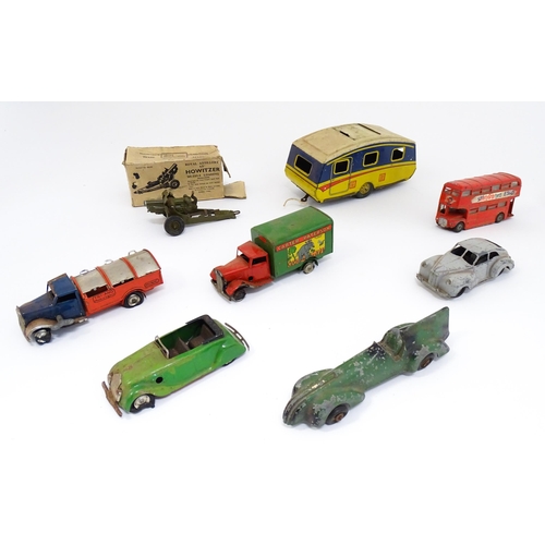 1300 - Toys: A quantity of vintage toys to include Teletone, a die cast scale mode Dinky Toys Routemaster B... 