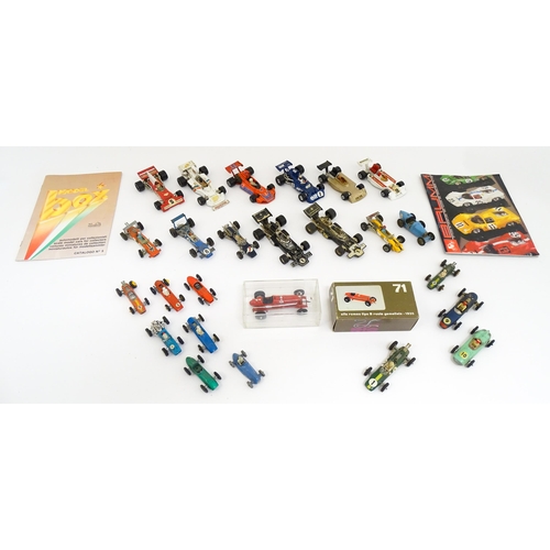 1302 - Toys: A quantity of assorted die cast scale model racing cars, makers to include Corgi Toys: Lotus-C... 