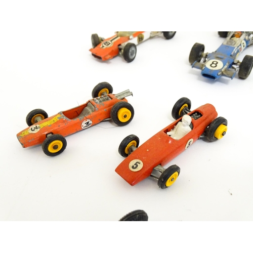 1302 - Toys: A quantity of assorted die cast scale model racing cars, makers to include Corgi Toys: Lotus-C... 