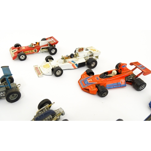 1302 - Toys: A quantity of assorted die cast scale model racing cars, makers to include Corgi Toys: Lotus-C... 