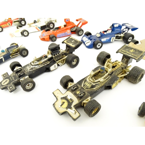 1302 - Toys: A quantity of assorted die cast scale model racing cars, makers to include Corgi Toys: Lotus-C... 