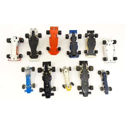 1302 - Toys: A quantity of assorted die cast scale model racing cars, makers to include Corgi Toys: Lotus-C... 
