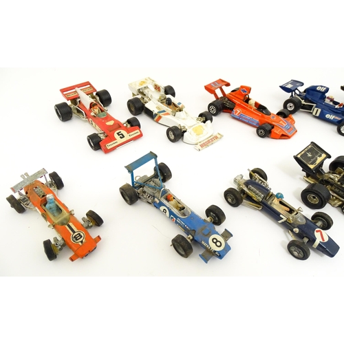 1302 - Toys: A quantity of assorted die cast scale model racing cars, makers to include Corgi Toys: Lotus-C... 