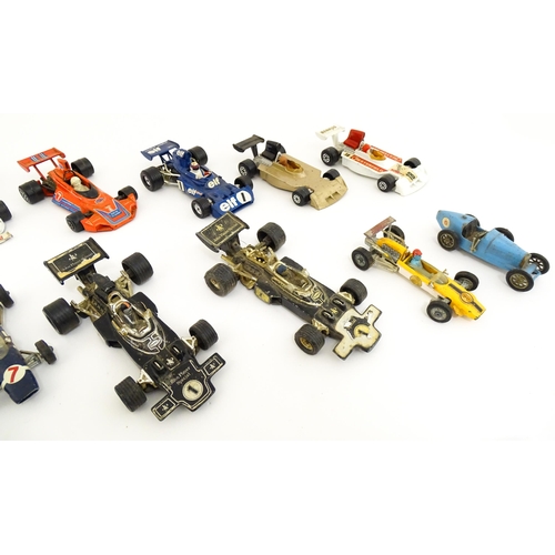 1302 - Toys: A quantity of assorted die cast scale model racing cars, makers to include Corgi Toys: Lotus-C... 