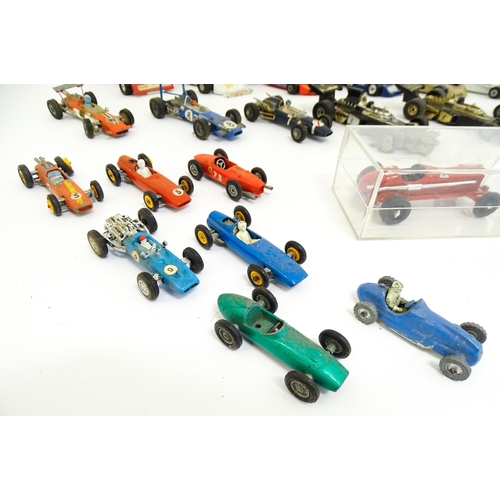 1302 - Toys: A quantity of assorted die cast scale model racing cars, makers to include Corgi Toys: Lotus-C... 
