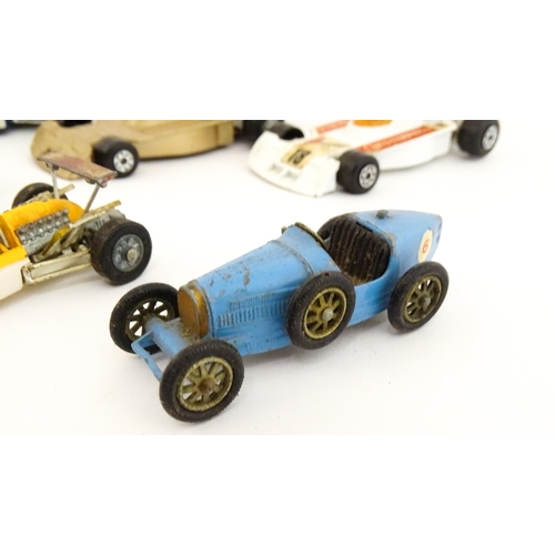 1302 - Toys: A quantity of assorted die cast scale model racing cars, makers to include Corgi Toys: Lotus-C... 