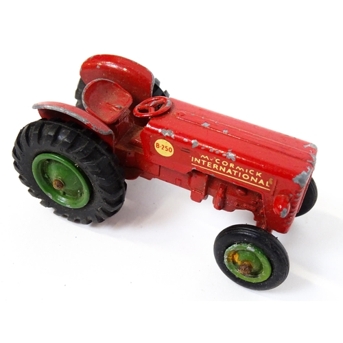 1320 - Toys: A tinplate Tri-ang Hi-way Milk Float / truck with milk bottles. Approx. 13 3/4