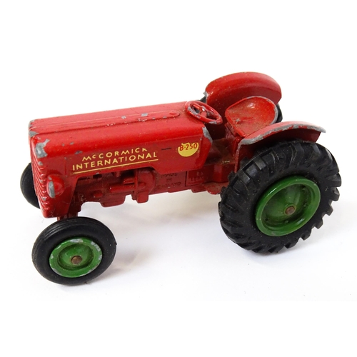 1320 - Toys: A tinplate Tri-ang Hi-way Milk Float / truck with milk bottles. Approx. 13 3/4