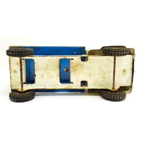 1320 - Toys: A tinplate Tri-ang Hi-way Milk Float / truck with milk bottles. Approx. 13 3/4