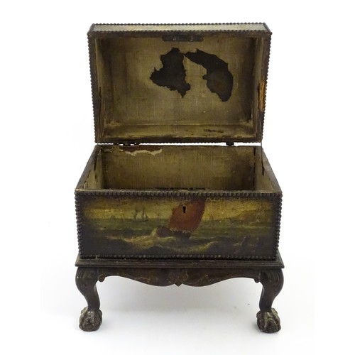 1166 - A domed chest on stand / trunk with painted decoration depicting ships at sea, and stud detail. Appr... 