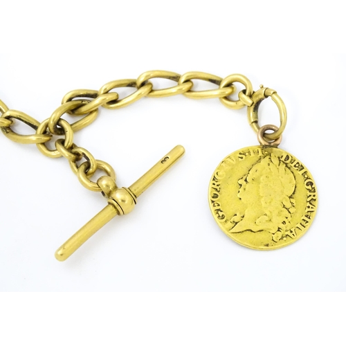 793 - An 18ct gold Albert watch chain with George II guinea coin formed fob. Chain approx. 15