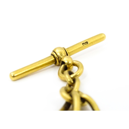 793 - An 18ct gold Albert watch chain with George II guinea coin formed fob. Chain approx. 15