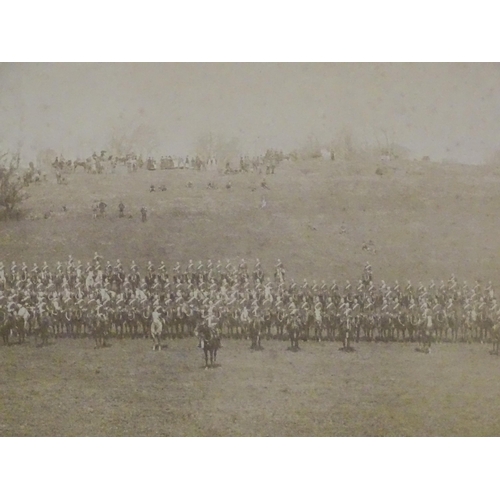 2 - Militaria: a Victorian monochrome photograph depicting a parade formation of cavalry troops in parkl... 