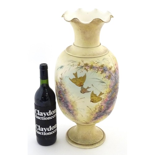 3 - A Victorian vase with a flared rim with hand painted and gilt decoration depicting birds and flowers... 