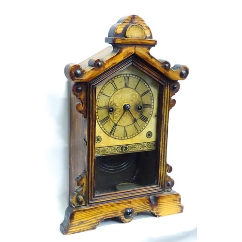 7 - A continental mantle clock with Roman chapter ring and striking on a gong. Together with a Continent... 