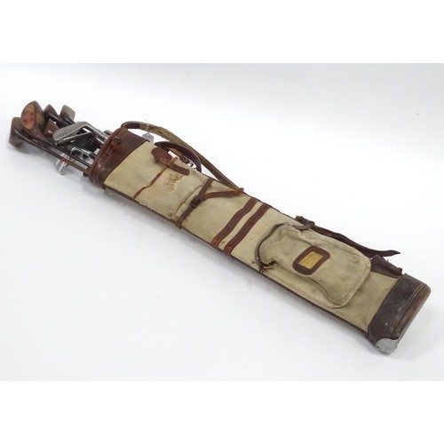 8 - A mid 20thC golf bag and clubs, including three hardwood drivers stamped 'Fred Whitting - Sandwich',... 