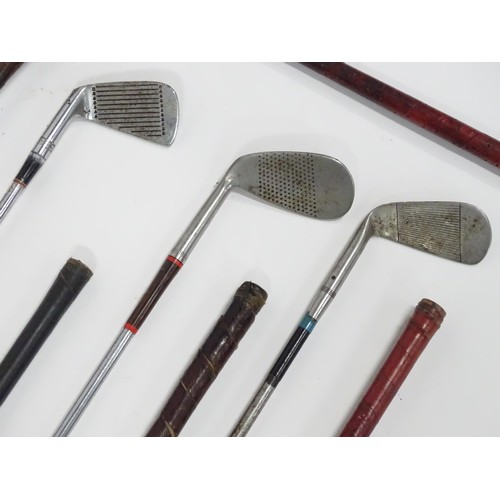 8 - A mid 20thC golf bag and clubs, including three hardwood drivers stamped 'Fred Whitting - Sandwich',... 