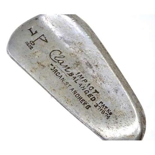 8 - A mid 20thC golf bag and clubs, including three hardwood drivers stamped 'Fred Whitting - Sandwich',... 