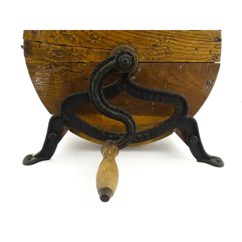 9 - A 19thC knife cleaner / sharpener, with oak case and cast iron supports stamped Murton & Varley. App... 