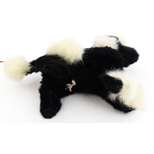 14 - Toy: A 20thC Cragstan battery operated toy dog titled Jumping Princess Poodle. With box. Approx. 8 1... 