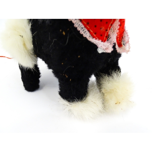 14 - Toy: A 20thC Cragstan battery operated toy dog titled Jumping Princess Poodle. With box. Approx. 8 1... 