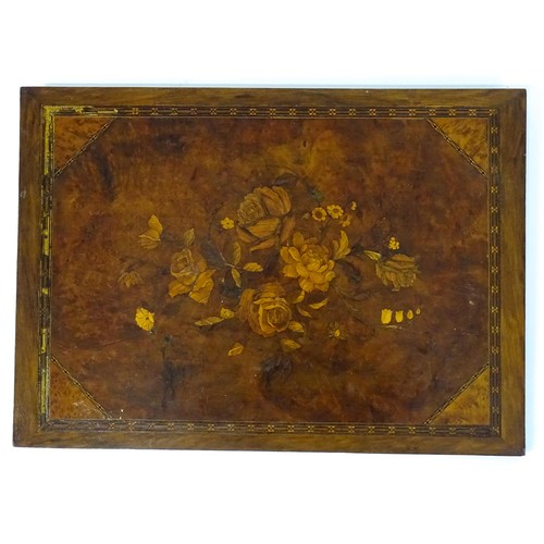 16 - A 20thC marquetry panel with inlaid rose and flower decoration. Approx. 15 3/4