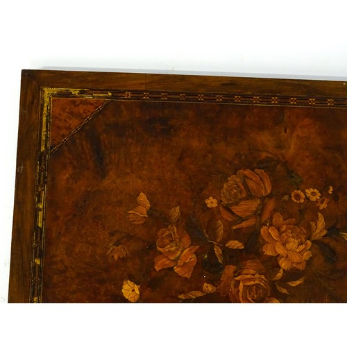 16 - A 20thC marquetry panel with inlaid rose and flower decoration. Approx. 15 3/4