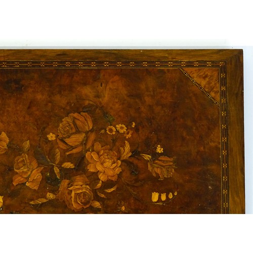 16 - A 20thC marquetry panel with inlaid rose and flower decoration. Approx. 15 3/4