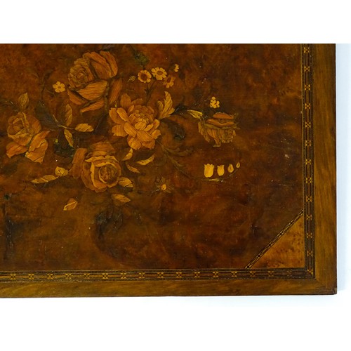 16 - A 20thC marquetry panel with inlaid rose and flower decoration. Approx. 15 3/4