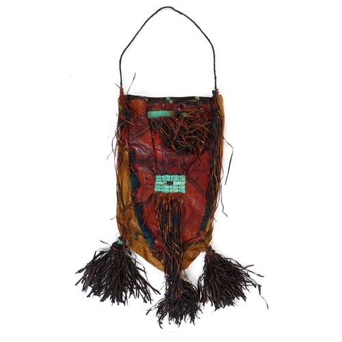 20 - Ethnographic / Native / Tribal : A Tuareg style leather camel bag with dyed panel detail, geometric ... 