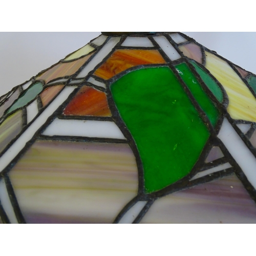 27 - A stained glass pendant light shade, in the Tiffany style. Approx. 26