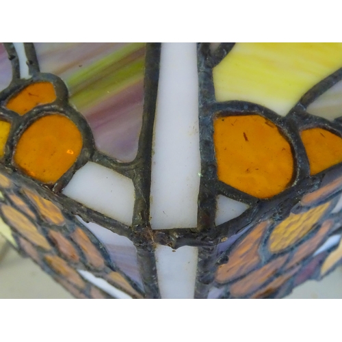 27 - A stained glass pendant light shade, in the Tiffany style. Approx. 26