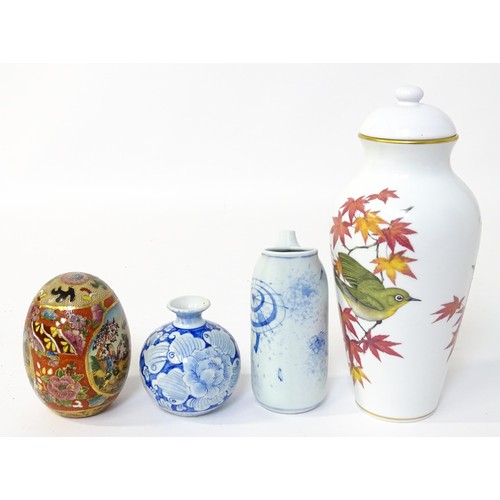 42 - Four ceramic items comprising a Franklin porcelain Japan vase and cover decorated with birds and lea... 