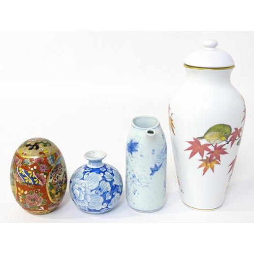 42 - Four ceramic items comprising a Franklin porcelain Japan vase and cover decorated with birds and lea... 
