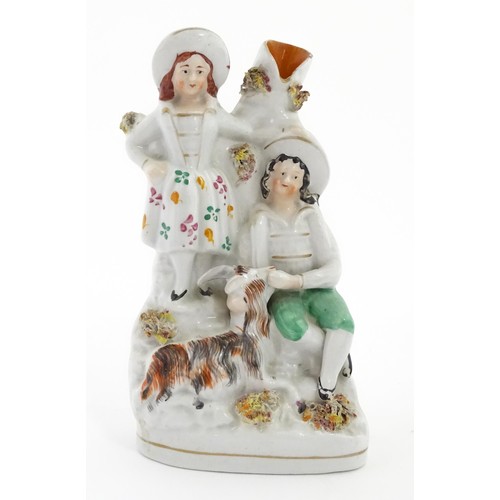 46 - Assorted items to include a Staffordshire pottery spill vase with figural detail, a pot lid titled P... 