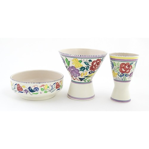 47 - Three items of Poole Pottery to include a bowl, and two vases of flared, waisted form. Tallest appro... 