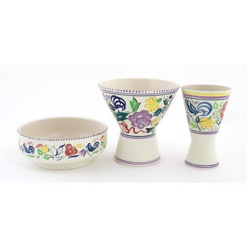 47 - Three items of Poole Pottery to include a bowl, and two vases of flared, waisted form. Tallest appro... 